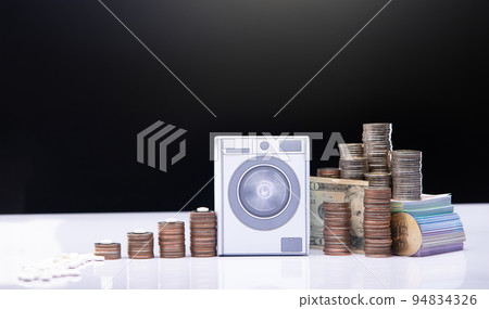 Money Coin stack to Washing Machine to laundering to big Investment Asset. Laundry illegal money Concept. Financial Wealth Tax economy is fraud dirty dollar to Success rich business man, copy space 94834326