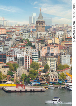 Istanbul city view of Golden Horn, from the sea with Galata Tower in the far end, Turkey Istanbul city view of Golden Horn, from the sea with Galata Tower in the far end, Turkey 94835908