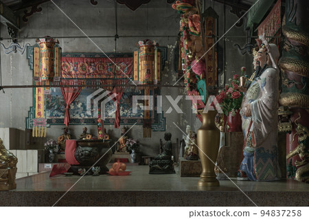 Architecture interior of Traditional chinese shrine and Chinese god statues on Chinese altar table. Architecture interior of Traditional chinese shrine and Chinese god statues on Chinese altar table. 94837258