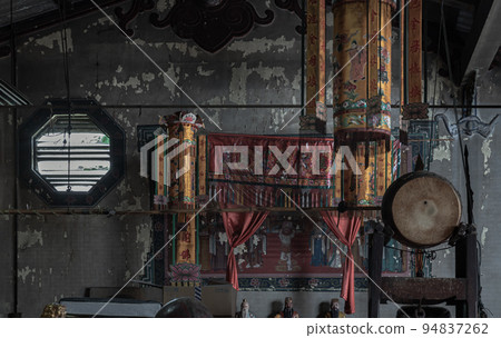 Architecture interior of Traditional chinese shrine with Traditional Chinese drum and Octagon louver vent on old wall at Phutthamonthon sathan. Architecture interior of Traditional chinese shrine with Traditional Chinese drum and Octagon louver vent on old wall at Phutthamonthon sathan. 94837262