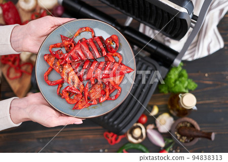 cooking at home on electric grill - red pepper cooking at home on electric grill - red pepper 94838313