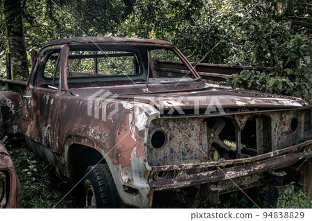 Old vintage truck car wreck used to transport ore from the mine to the steelworks. Old vintage truck car wreck used to transport ore from the mine to the steelworks. 94838829