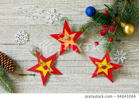 Christmas gift or Christmas decorations of handmade paper. Handmade. Project of children's creativity, handicrafts, crafts for kids. Christmas gift or Christmas decorations of handmade paper. Handmade. Project of children's creativity, handicrafts, crafts for kids. 94841084