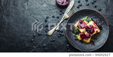 Baked pangasius fish with blueberries Baked pangasius fish with blueberries 94842627
