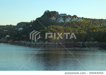 Row of houses rich in nature near Bergen, Norway Row of houses rich in nature near Bergen, Norway 94844956