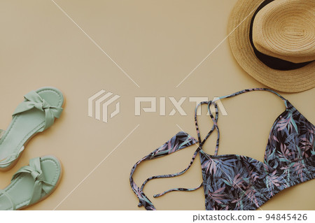 Summer image Swimwear, straw hat, skin care, sunscreen 94845426