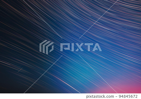 Flight Of Fancy. Abstract Amazing Star Trails On Night Sky Background. Bright Night Starry Sky. Soft Colours. Large Exposure. Imagination, Fantasy, Illusion, Dream View. Saturated Bright Blue, Red Flight Of Fancy. Abstract Amazing Star Trails On Night Sky Background. Bright Night Starry Sky. Soft Colours. Large Exposure. Imagination, Fantasy, Illusion, Dream View. Saturated Bright Blue, Red 94845672