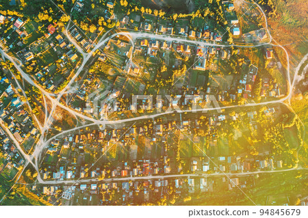 Aerial View Of Town Village Cityscape Skyline In Summer Sunny Morning. Daytime. Residential Houses. Small European City. Residential Areas Aerial View Of Town Village Cityscape Skyline In Summer Sunny Morning. Daytime. Residential Houses. Small European City. Residential Areas 94845679
