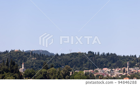 Panoramic view of the mountainous and green densely forested expanses of Corfu island Panoramic view of the mountainous and green densely forested expanses of Corfu island 94846288