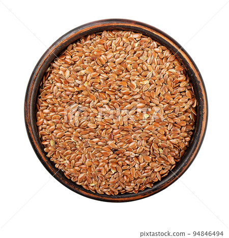 Clay bowl of flaxseed isolated on white background. File contains clipping path. Clay bowl of flaxseed isolated on white background. File contains clipping path. 94846494
