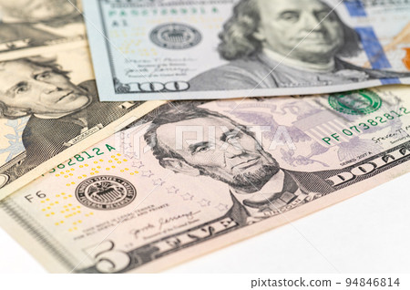 5, 20, 50, 100 dollars banknotes at different angles. Close up of dollars on white background. 5, 20, 50, 100 dollars banknotes at different angles. Close up of dollars on white background. 94846814