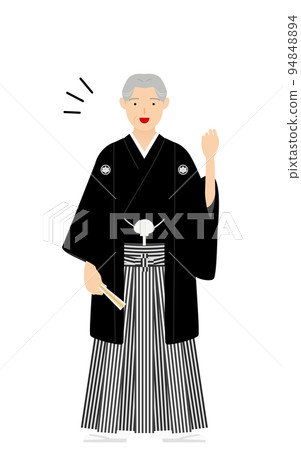 Senior man with a crested hakama (in Japanese clothes) makes a guts pose 94848894