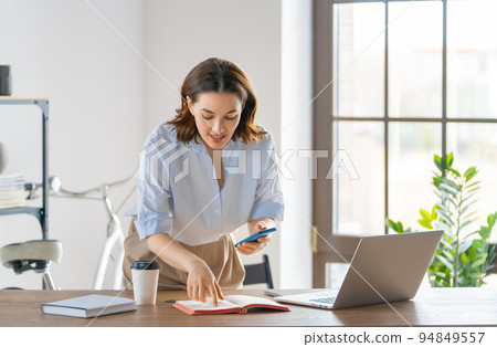 woman working in the office woman working in the office 94849557