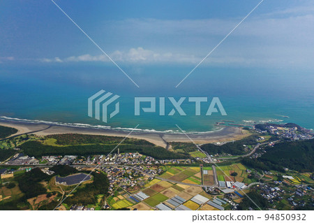 Aerial view from above Hyuga city 94850932