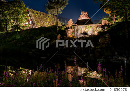 [Shirakawa-go] Lighted-up Minkaen in early autumn, Mizuorion Falls 94850978