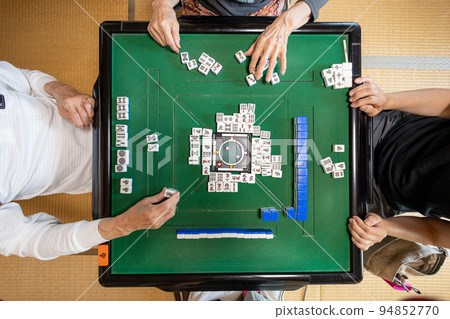 senior playing mahjong senior playing mahjong 94852770
