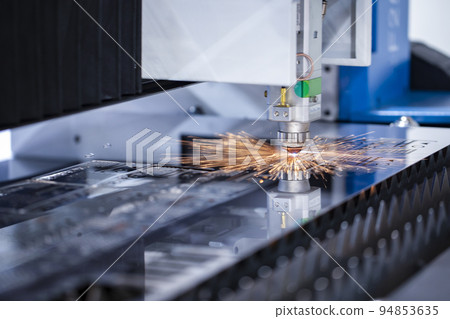 Cnc milling machine. Processing and laser cutting for metal in the industrial. Motion blur. Industrial exhibition of machine tools. 94853635