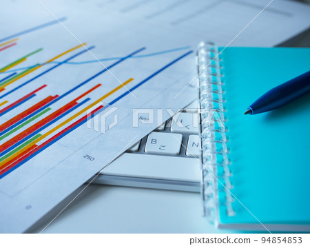 Business image of graphs, personal computers, notebooks Business image of graphs, personal computers, notebooks 94854853