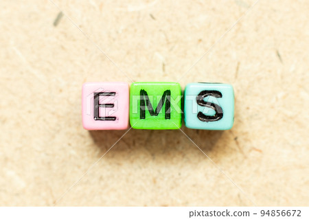 Color alphabet letter block in word EMS (abbreviation of emergency medical services or express mail service) on wood background Color alphabet letter block in word EMS (abbreviation of emergency medical services or express mail service) on wood background 94856672