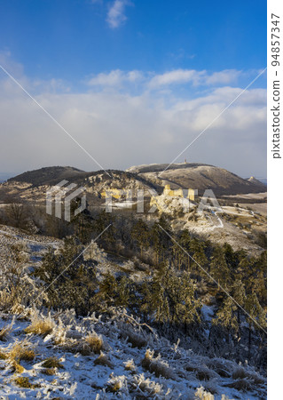 Palava winter landscape with Sirotci hradek ruins, Southern Moravia, Czech Republic Palava winter landscape with Sirotci hradek ruins, Southern Moravia, Czech Republic 94857347