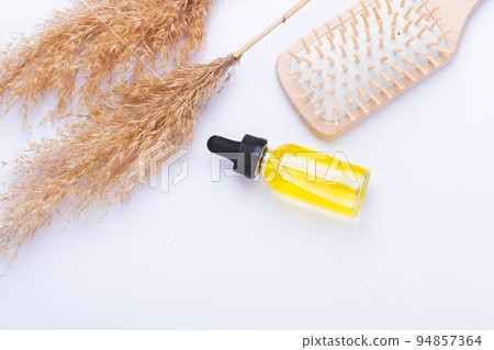 Oil for hair growth. Therapeutic oil to activate hair growth. Beauty and health. Oil for hair growth. Therapeutic oil to activate hair growth. Beauty and health. 94857364