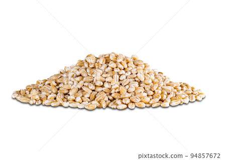 Pile of harvested dried pearl barley seeds isolated on white background. 94857672