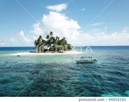 Uninhabited island JEEP island in Chuuk, Micronesia. Here is the world's greatest wreck diving destination. Uninhabited island JEEP island in Chuuk, Micronesia. Here is the world's greatest wreck diving destination. 94858185