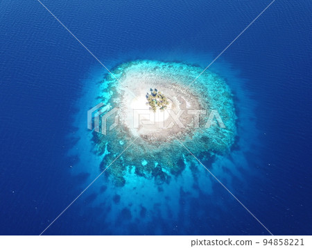 Uninhabited island JEEP island in Chuuk, Micronesia. Here is the world's greatest wreck diving destination. Uninhabited island JEEP island in Chuuk, Micronesia. Here is the world's greatest wreck diving destination. 94858221