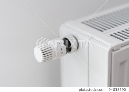 The room heating radiator thermostat is set to economy mode at 70% power The room heating radiator thermostat is set to economy mode at 70% power 94858590