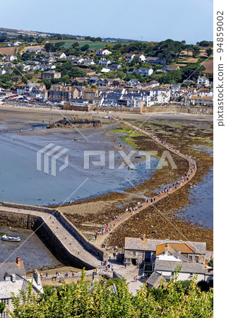 Iconic landmark of St Michael Mount harbor - Cornwall, England 94859002