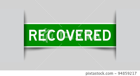 Green color square label sticker with word recovered that inserted in gray background 94859217