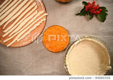 Top view: Fresh raw ingredients for making an American traditional pumpkin classic pie with a crispy crust. Copy advertising space. Thanksgiving Day. Flat lay. Still life 94860308