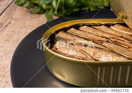 Canned fish - smoked sprats in oil. Conserve from herring, sprats and other small fish. 94861716
