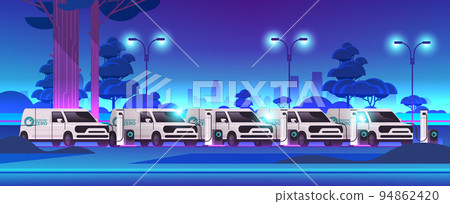 electric cargo vans charging battery vehicles at recharging power station charger EV management sustainable transport 94862420
