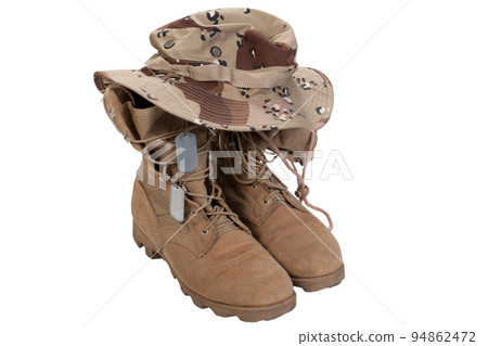 US Army combat boots desert pattern with boonie hat and dog tags 94862472