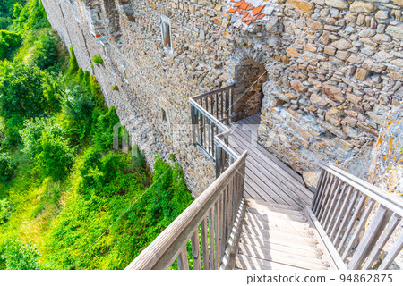 Wooden bridge and staircase in medieval castle 94862875