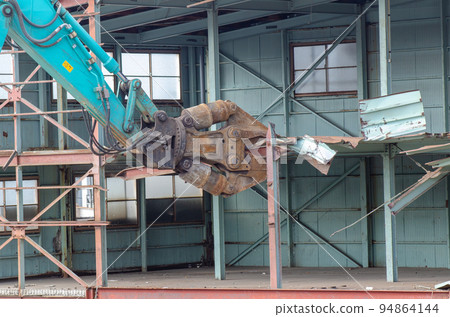 Warehouse demolition site Metal scrap Warehouse demolition site Metal scrap 94864144