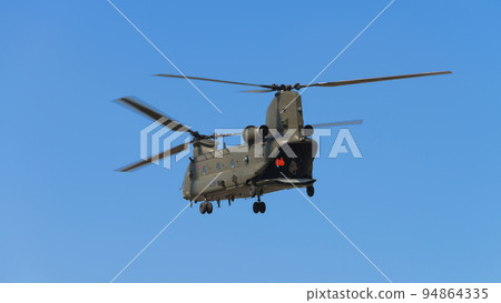 RAF Chinook HC2 helicopter in blue sky 94864335