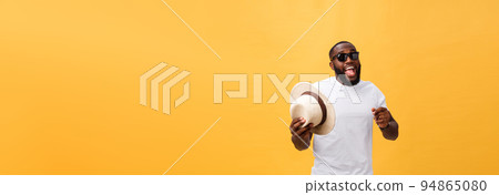 Young black man top dancing isolated on a yellow background. Young black man top dancing isolated on a yellow background. 94865080