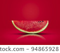 sliced watermelon put on a red background  94865928