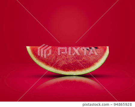 sliced watermelon put on a red background  94865928