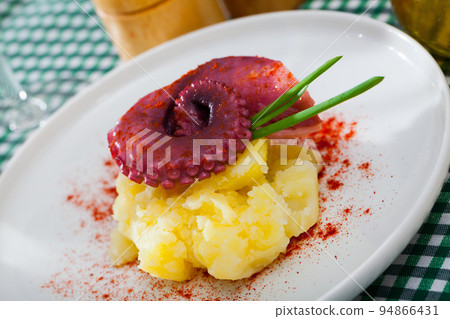 Tentacle of octopus with potatoes Tentacle of octopus with potatoes 94866431