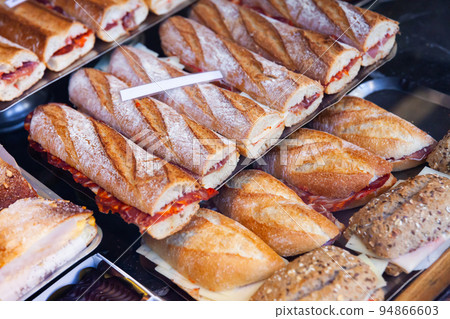 Different spanich sandwich - bocadillo at shop window Different spanich sandwich - bocadillo at shop window 94866603