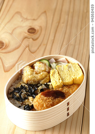 Seaweed bento with dashi-rolled omelet and tenderloin cutlet Seaweed bento with dashi-rolled omelet and tenderloin cutlet 94868489