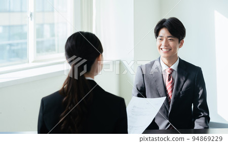College student receiving interview College student receiving interview 94869229