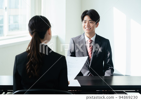 College student receiving interview 94869230