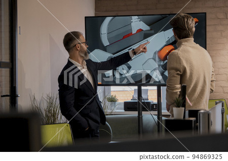 CEO of company studio developers of games discusses with the artist 3D model CEO of company studio developers of games discusses with the artist 3D model 94869325