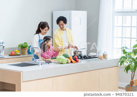 Close family cooking in the kitchen 94870321