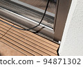 Broken screen door 94871302