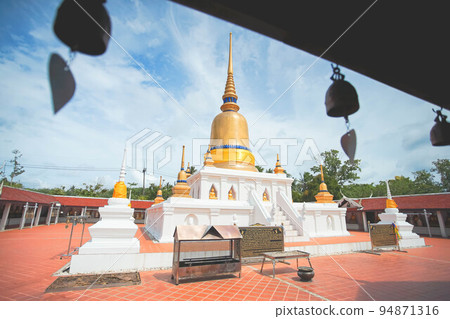 The famous temple Phra That Sawi, one of travel destinations in Chumphon, Thailand. The famous temple Phra That Sawi, one of travel destinations in Chumphon, Thailand. 94871316